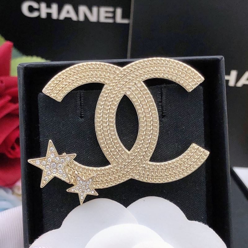 Ch*el brooches